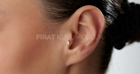 Yeni Yıl Piercing Modelleri ile Tarzınızı Işıltıyla Yenileyin