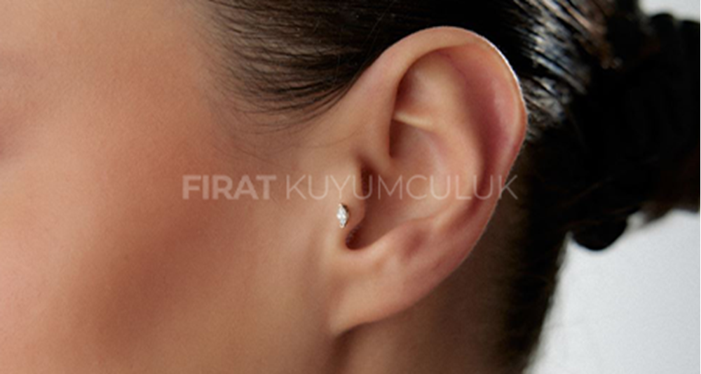 Yeni Yıl Piercing Modelleri ile Tarzınızı Işıltıyla Yenileyin